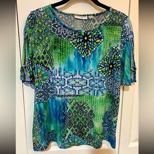 Susan Graver blouse. Size XS. Machine wash.
